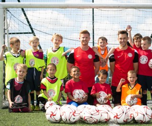 Matt & Sam with a group at summer camp 2016      